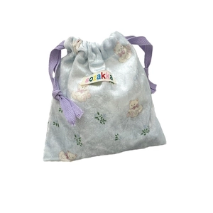 Cartoon bear velvet drawstring storage bag in light blue and purple with floral patterns