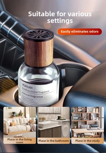 Close-up of 160ml glass car aroma diffuser with wood lid in cup holder and home setting