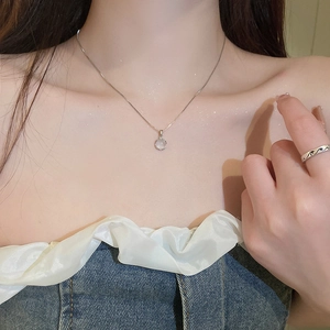 Minimalist silver necklace and ring set with opal stone charms for a graceful look