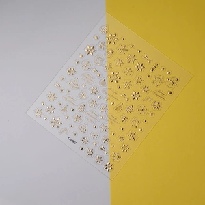 Detail of Co-067 golden 3D embossed Christmas nail stickers with snowflake patterns