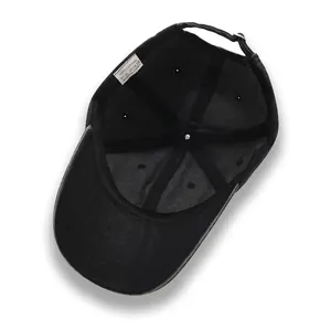 Classic washed black cotton baseball cap with interior 100% cotton label and metal buckle