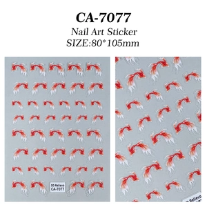 Detailed macro view of 5D relievo nail stickers featuring red and white goldfish patterns