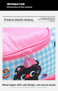 Detail of pink bunny metal zipper pullers on a cute cartoon plaid cosmetic bag