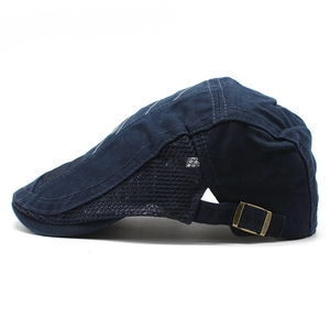 Navy mesh beret cap with breathable side panels and adjustable metal buckle closure