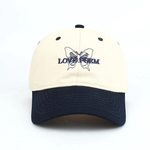 Detailed embroidery of Love Poem text and blue butterfly on two-tone baseball cap
