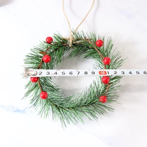 Artificial Christmas wreath with red berries and green pine needles, 15cm outer diameter