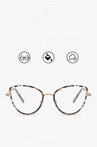 Cat eye glasses frame detail highlighting the 24g lightweight metal and leopard pattern