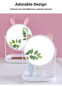 Detail of creative desktop makeup mirror with cute animal ears and a storage base tray