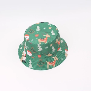Macro detail of dark green reversible sun hat with festive Christmas Santa prints
