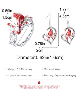 Detail view of red cardinal bird jewelry set showing dimensions and meaningful engraving