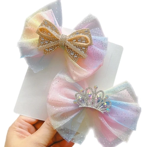 Rainbow gradient mesh bow hair clips with rhinestone crown and butterfly details