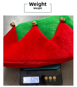 Detailed view of striped Christmas hat weight measurement of 60.4g with gold bells