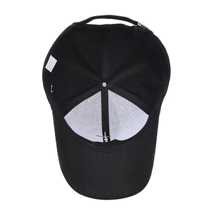Internal view of black polyester baseball cap showing high-quality stitching and washing label