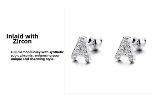 Macro shot of silver letter A stud earring with cubic zirconia and screw back ball