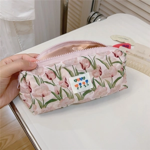 Close-up of pink tulip floral pencil case showing smooth zipper and fabric lining
