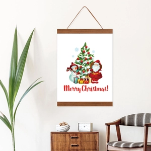 Christmas poster with wooden magnetic hanger featuring Santa and snowman on white wall