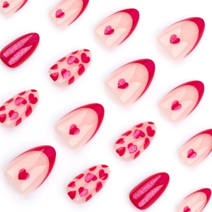 French red heart press-on nails set in long almond shape with glossy finish