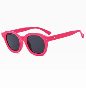 Detailed side view of rose red square sunglasses with dark grey resin lenses