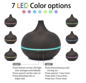 Detail showing deep wood grain diffuser with 7-color LED lights and mist control buttons