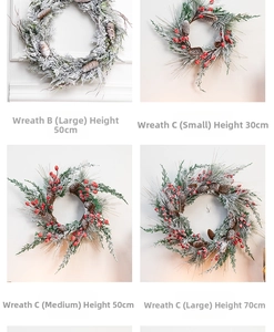 Detail view of red berry Christmas wreath styles with snow effect and pine cones