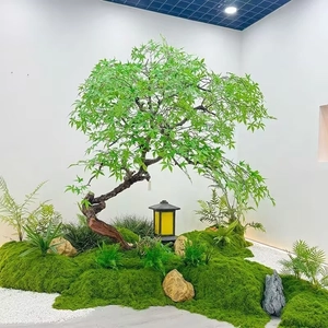 Close-up of artificial moss lawn and Japanese landscape lamp for bonsai decoration
