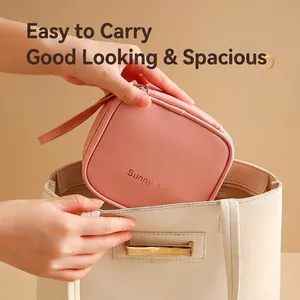 Pink PU waterproof sanitary napkin storage bag with zipper and Sunny Girl embossed text