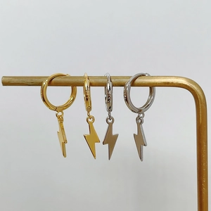Close-up of S925 sterling silver lightning bolt hoop earrings in gold and silver finish