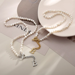 Baroque pearl necklaces with OT buckle and B pendant in gold and silver finish