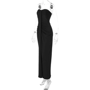 Detailed view of the elegant black ruched evening dress with a floor-length silhouette