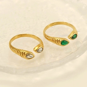 Adjustable golden stainless steel rings with green and white teardrop zircons