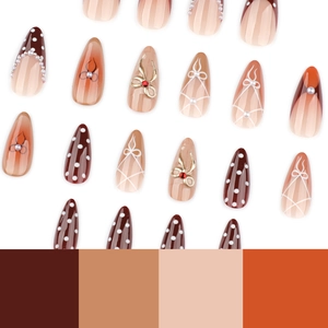 Faux ongles amande avec pois blancs, nœuds métalliques et détails de perles