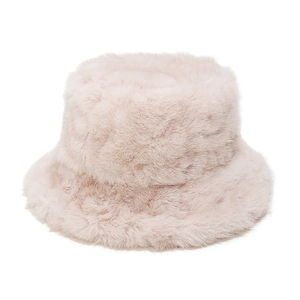 Macro view showing the soft texture of a thick plush faux fur bucket hat for winter