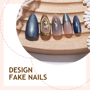 3D gold-tone French cat-eye press-on nails with rose charms and celestial sun patterns