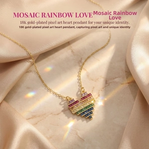 Detail of 18K gold-plated rainbow mosaic heart necklace on champagne silk and stone