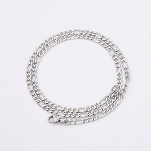 Classic silver stainless steel Figaro chain necklace with lobster clasp on white background
