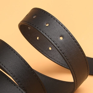 Black faux leather belt with pebble texture and stitch detail for women's casual jeans