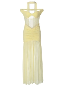 Sexy pale yellow halter maxi dress with sheer mesh panels and draped ruched detailing