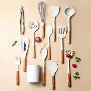 12-piece cream white silicone kitchen utensil set with wooden handles and storage bucket