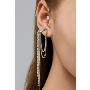 Close-up of a silver fashion ear cuff with long tassels and sparkling rhinestone accents