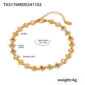 Detail of gold stainless steel clover bracelet with multicolor enamel and size specs