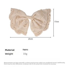 Lace bow hair clip detail with dimensions 25x17cm and intricate floral embroidery