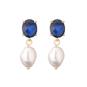 Detail of elegant gold earrings featuring oval blue gemstones and baroque pearls
