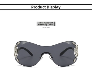 Close-up of silver snake frame detail with hollow rhinestone decor on trendy sunglasses