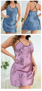 Macro view of satin nightgown featuring love prints and cross-back spaghetti straps