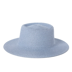 Light blue woven boater straw hat with wide brim for sun protection and outdoor travel
