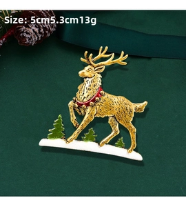 Detailed reindeer Christmas brooch with red enamel in 5cm x 5.3cm size dimensions