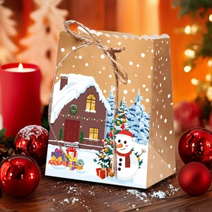 Detailed close-up of a gingerbread house gift box with twine on a festive table
