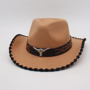 Classic western cowboy hat in brown felt with bull head emblem and black stitched brim