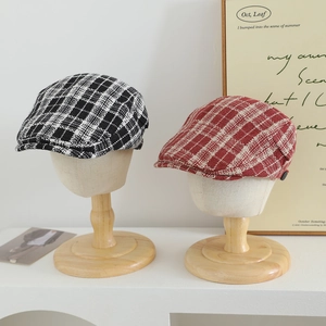Kids houndstooth wool beret hats in black and red plaid patterns for autumn and winter