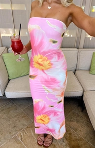 Detailed close-up of pink floral tube maxi dress with yellow and white flower patterns